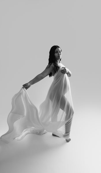 A black and white portrait capturing the pregnant woman for maternity photos Tampa