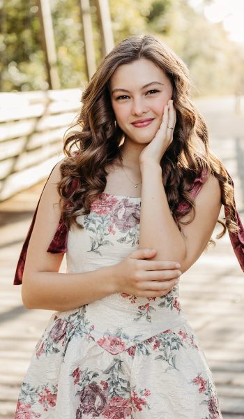 high school senior girl poses for her session by tampa senior photographer