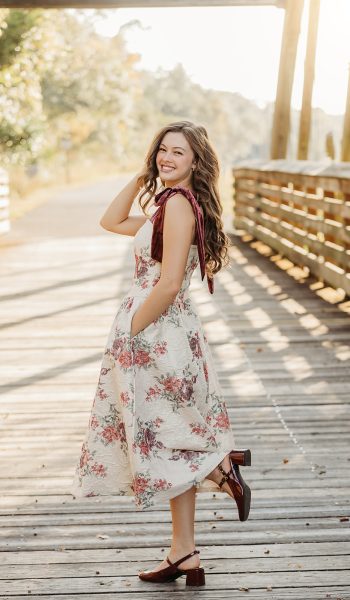 high school senior girl poses for her session by tampa senior photographer