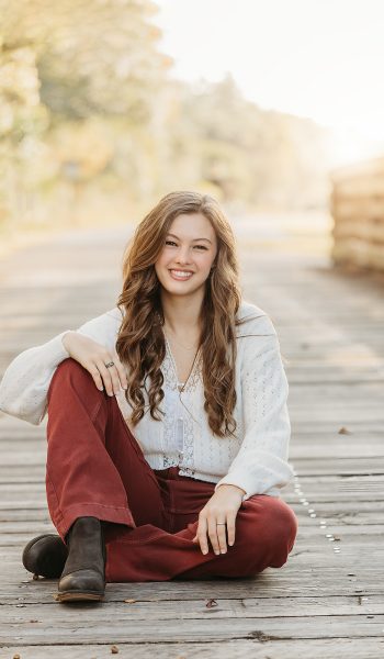 high school senior girl poses for her session by tampa senior photographer