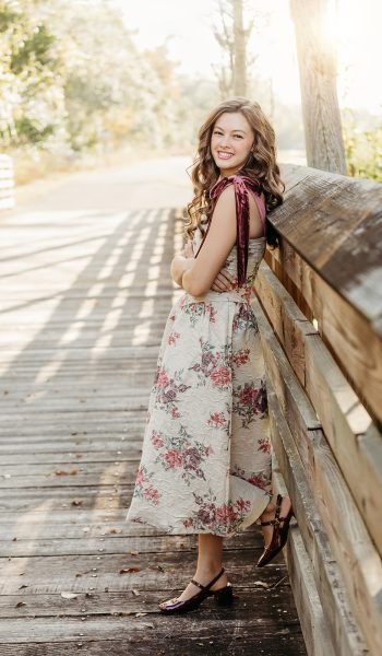 high school senior girl poses for her session by tampa senior photographer
