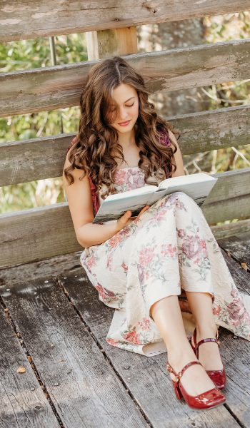 high school senior girl poses for her session by tampa senior photographer
