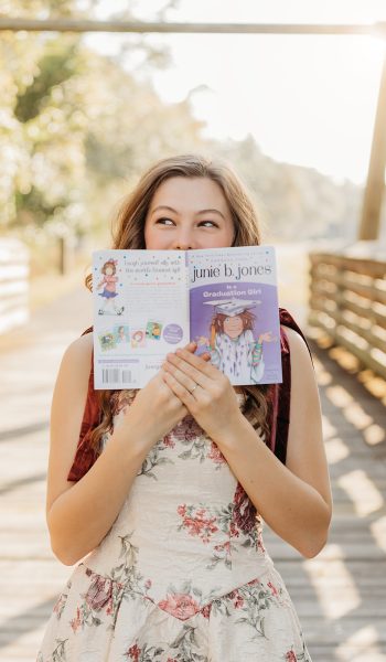 high school senior girl poses for her session by tampa senior photographer