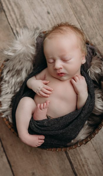 newborn photos tampa baby boy swaddled during tampa newborn photos club foot